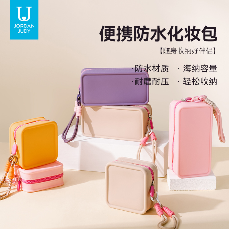 New dopamine color-block silicone handheld makeup bag for female students, portable and large-capacity phone bag and storage bag