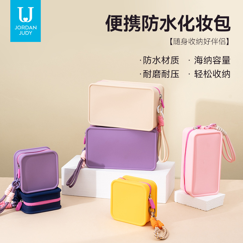 New dopamine color-block silicone handheld makeup bag for women, new portable large-capacity waterproof phone bag, miscellaneous bag